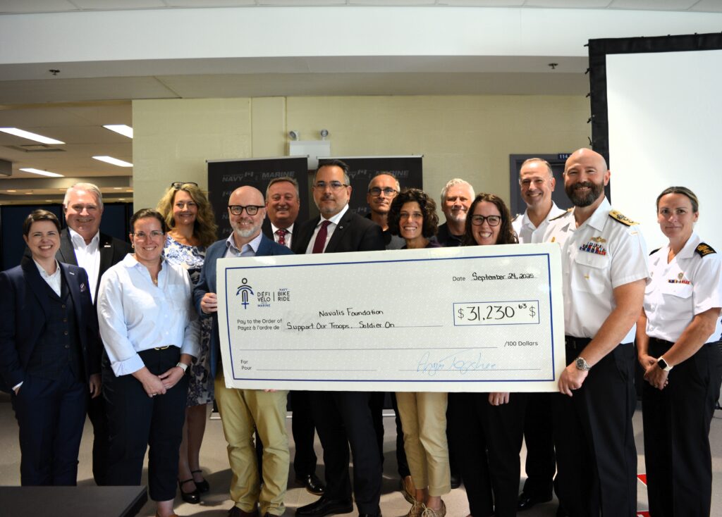 Navy Bike Ride organizers and sponsors present a $31,230 cheque to representatives from the Navalis Foundation, Support Our Troops and Soldier On. // Les organisateurs et les commanditaires du Défi-vélo de la Marine remettent un chèque de 31 230 $ aux représentants de la Fondation Navalis, d'Appuyons nos troupes et de Sans limites.